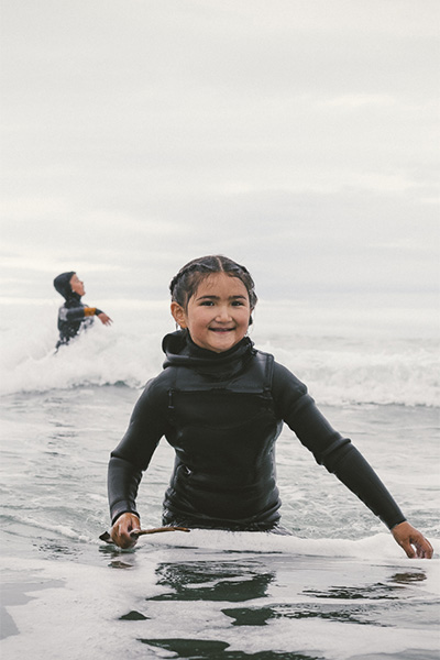 Girl_Surfing_And_Group_Circle