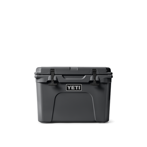 https://yeti-web.imgix.net/38576640d86d3c05/W-220078_1H23_Color_Launch_site_studio_Hard_Coolers_Tundra_35_Charcoal_Front_3354_Primary_A_2400x2400.png?bg=0fff&auto=format&w=500&q=68&h=500&fit=fill