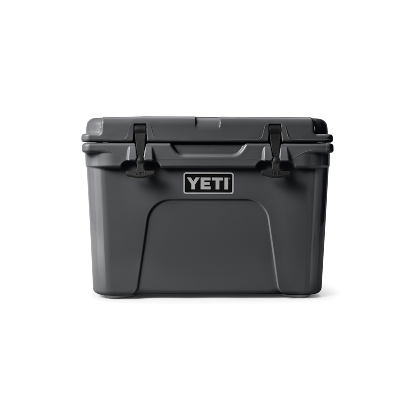 https://yeti-web.imgix.net/3a928ea4c800d80/W-220078_1H23_Color_Launch_site_studio_Hard_Coolers_Tundra_35_Charcoal_Front_3354_Primary_B_2400x2400.png?bg=0fff&auto=format&w=846&h=846