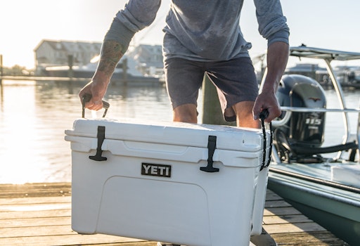 https://yeti-web.imgix.net/5eb70ca4894f5874/original/Tundra_45_Hard_Cooler_Product_Overview_Image_Lifestyle-1x.jpg?auto=format&fit=crop&w=512&h=350